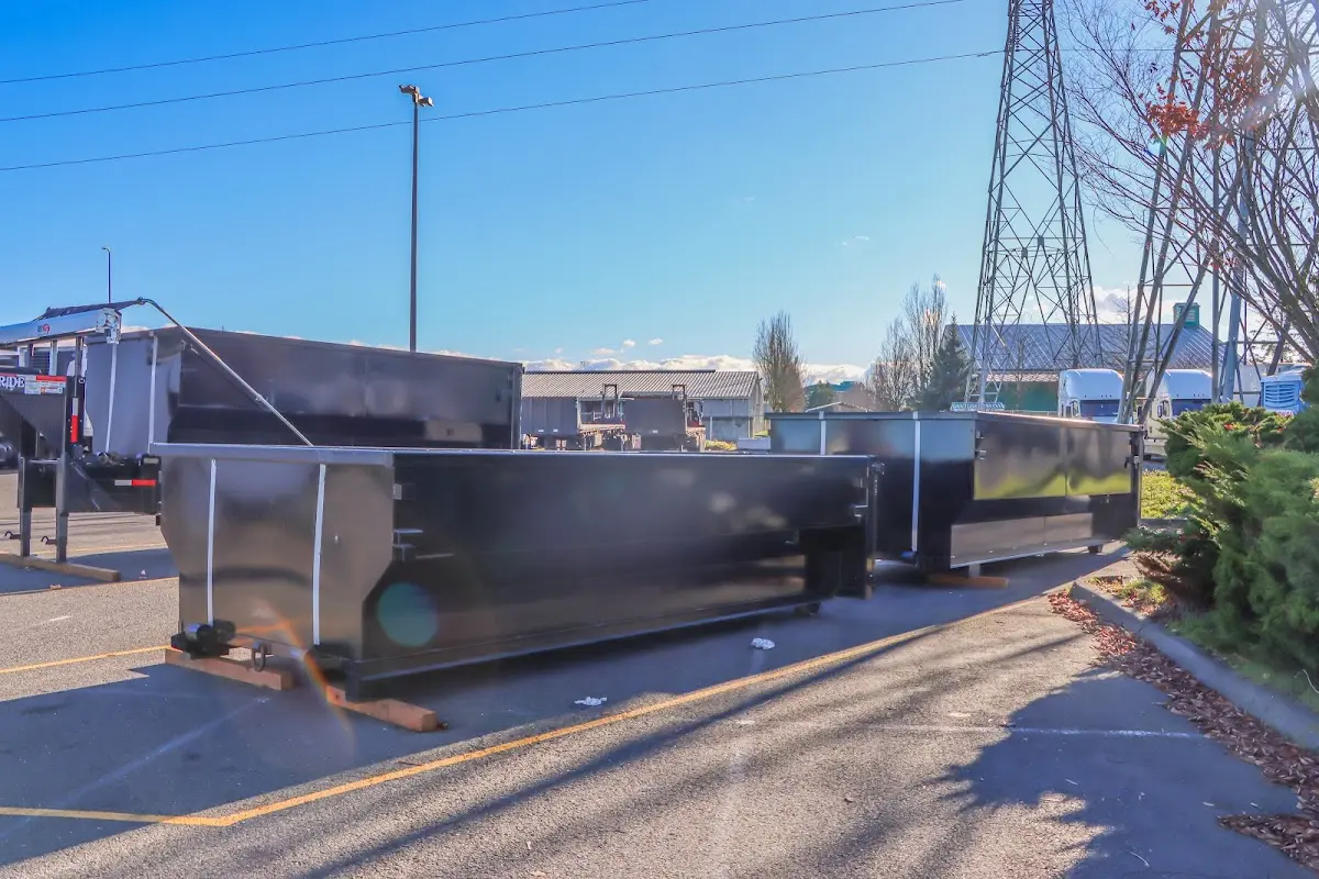 Roll-off dumpster ready for waste disposal at job site for 2 Yard Dumpster Rental in Sartell